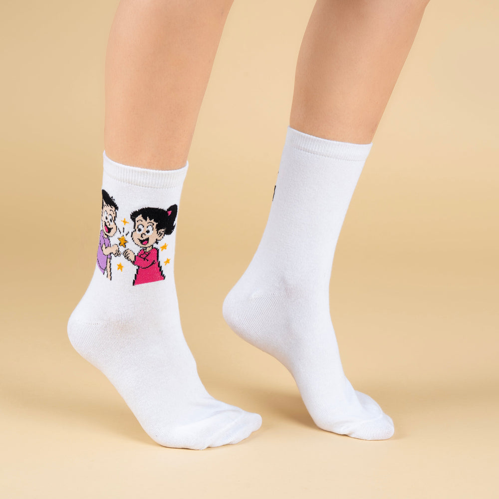 White socks with cartoon character design worn by a person on a beige background