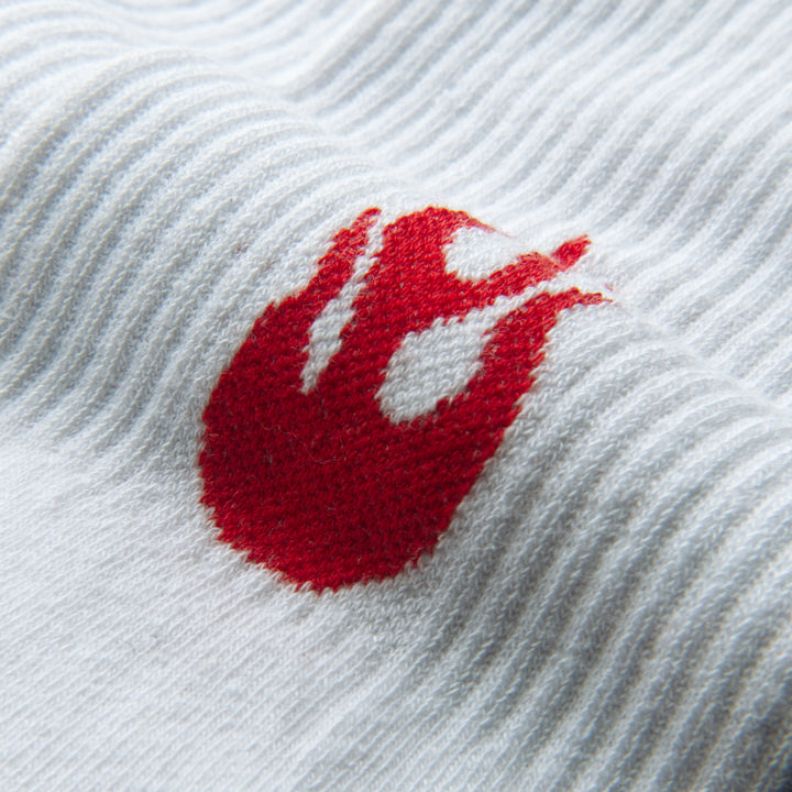 Close-up of a red and white logo on a textured white background-Flame Runners Edition (Early Access Pass)-